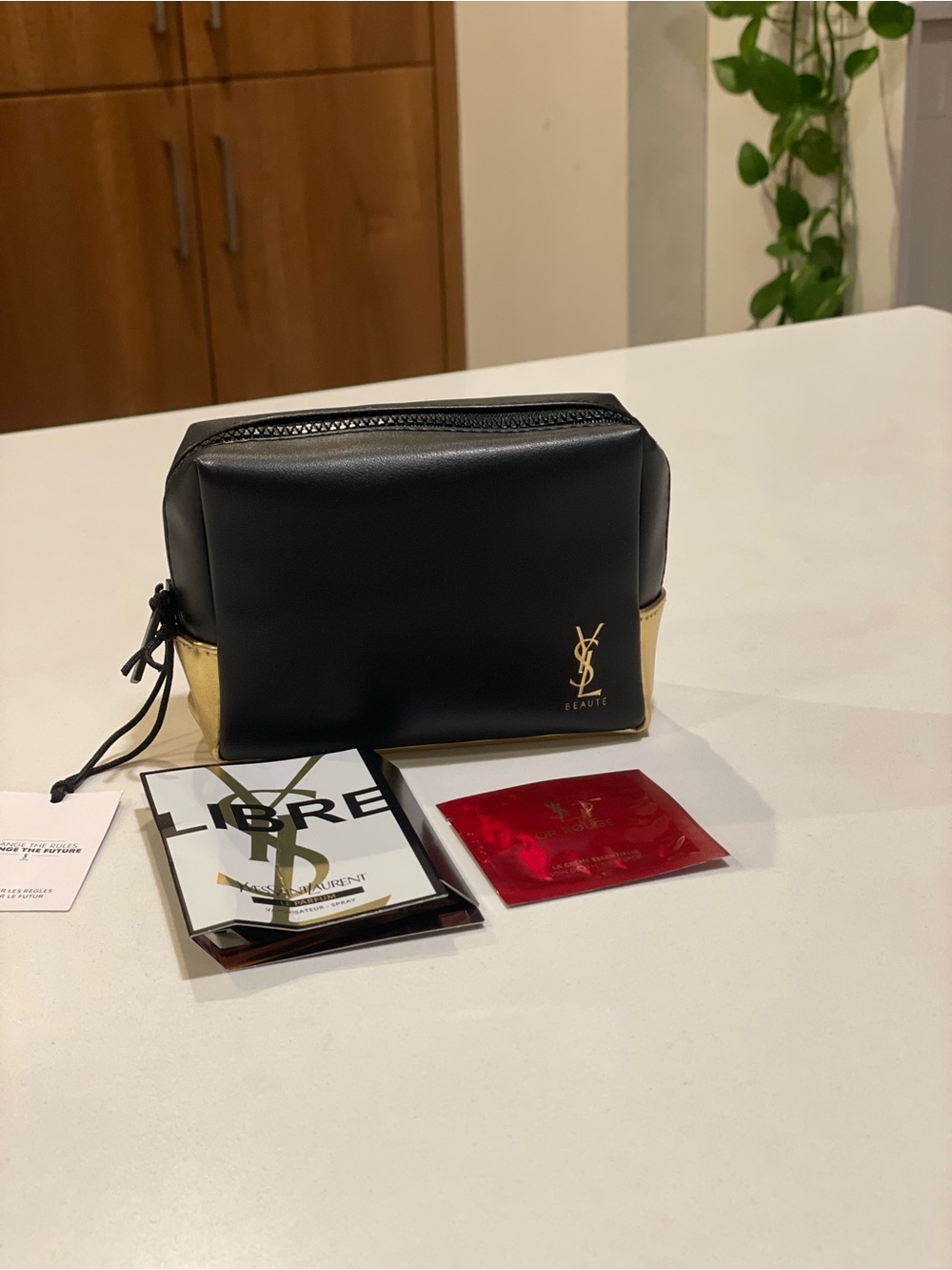 Yves Saint Laurent Beauty Black and Gold Leather Pouch